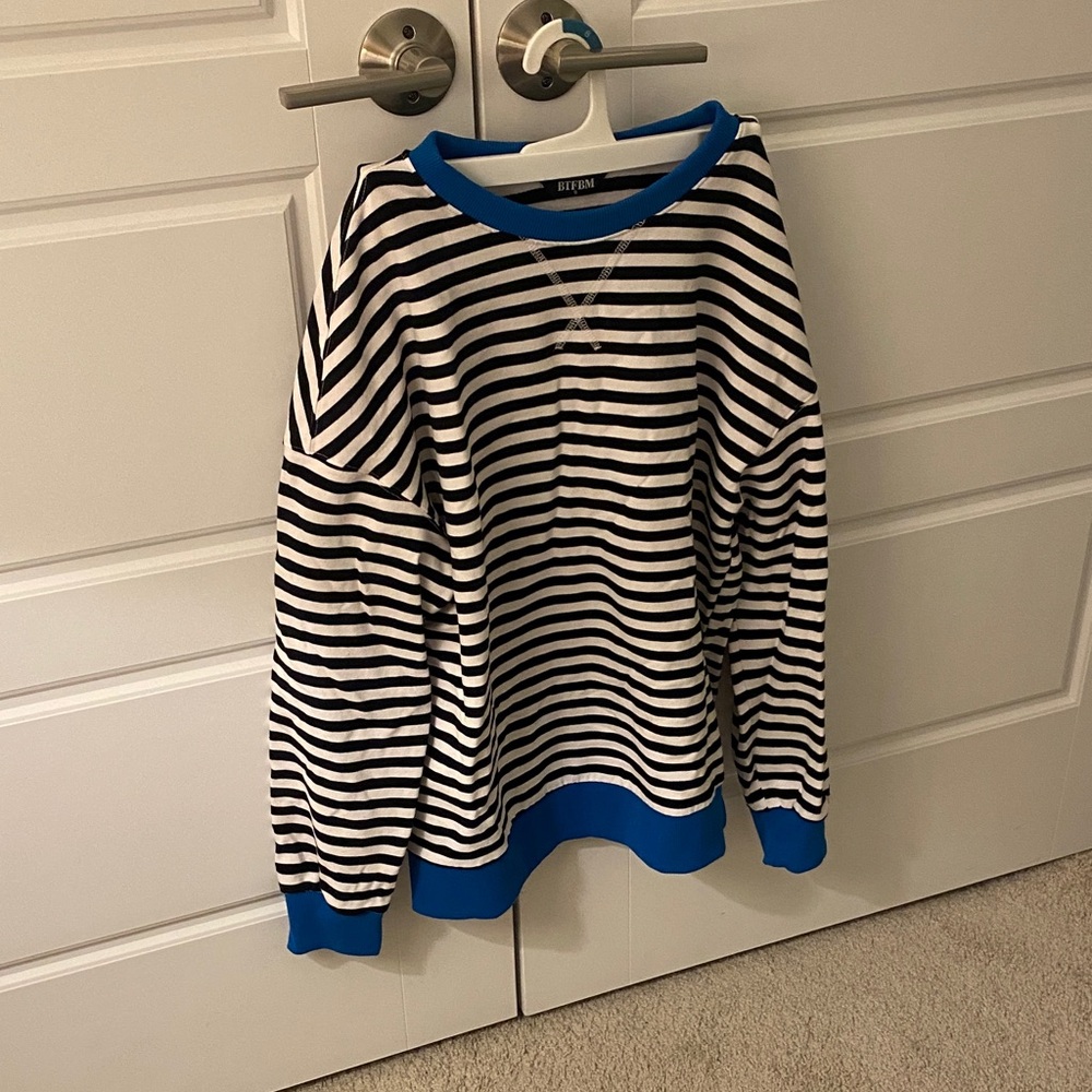 Striped Black and White Sweater with Blue Accents